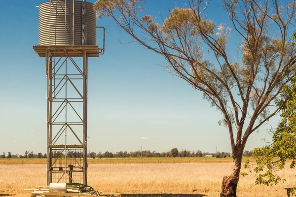 Image of water tank in a dry golden landscape